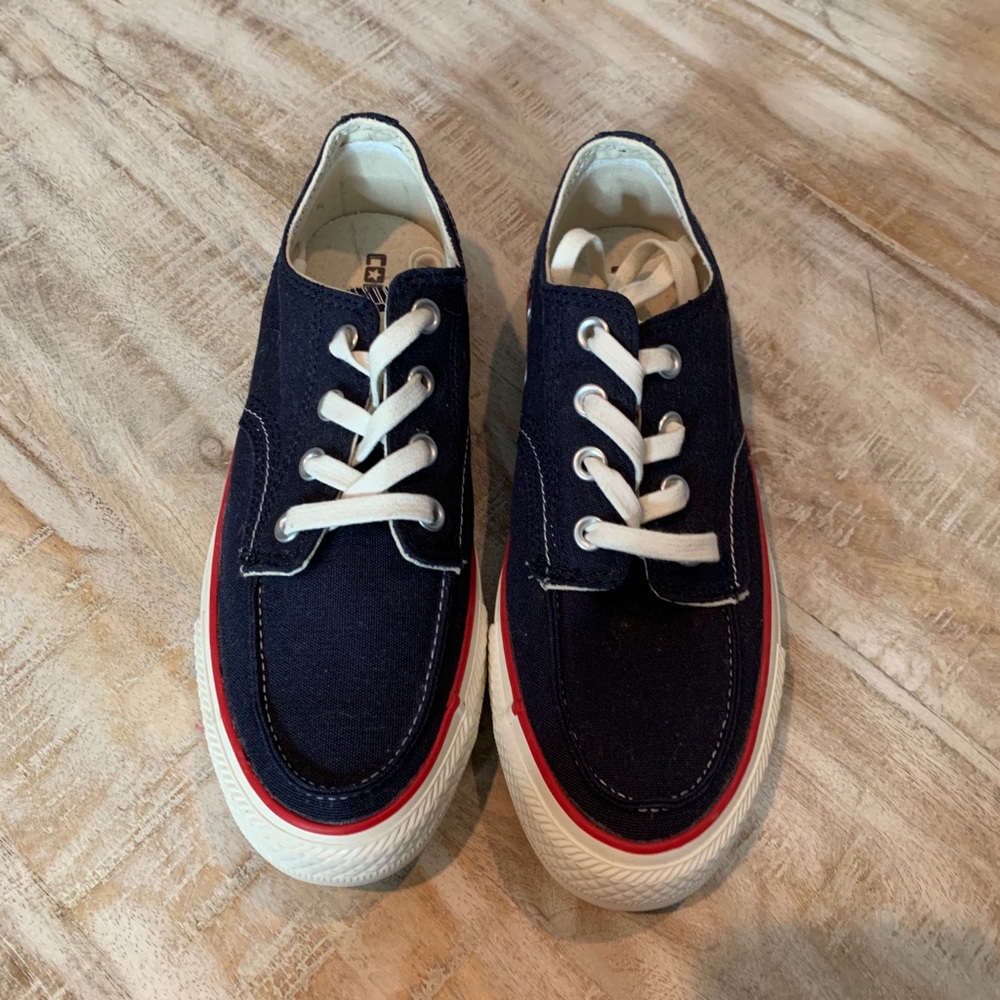 Brand new CONVERSE. Navy. Size 5.5 men, 7.5 women